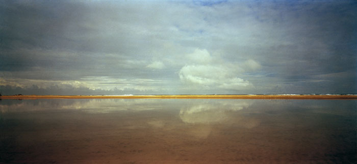 Photograph - Sy reflection on lake